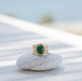 Golden anti-tarnish ring with green emarald