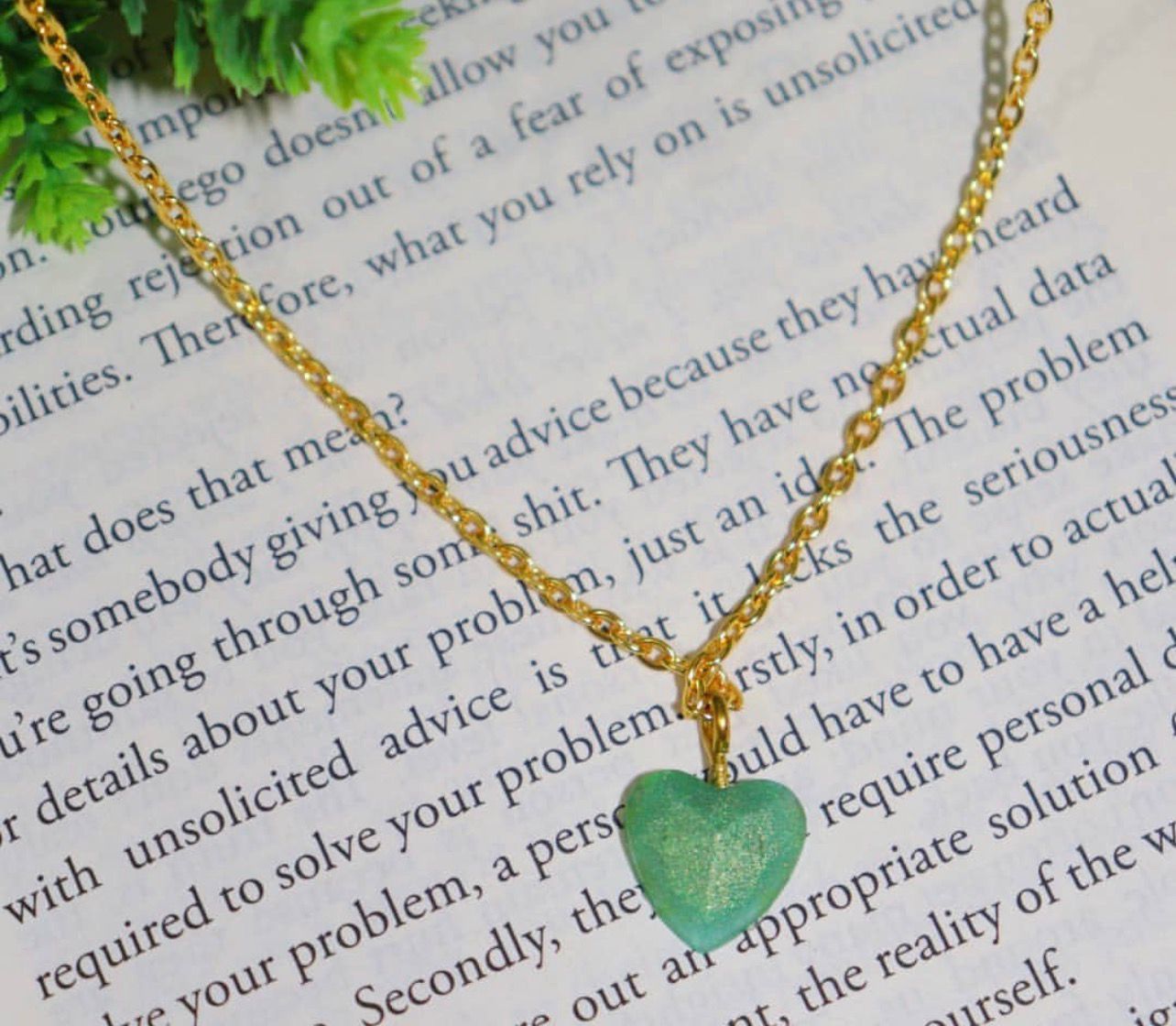 Green shiny resin pendant with chain